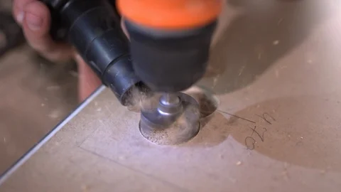 The Builder works with an electric cutter Stock Footage 103950418