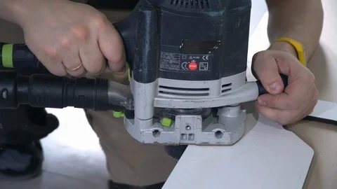 The Builder works with an electric cutter 動画素材 103950499