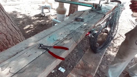 The builder works with a wire. Video stock 77291517