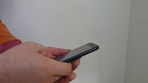 Builder writes sms Stock Footage 103643874