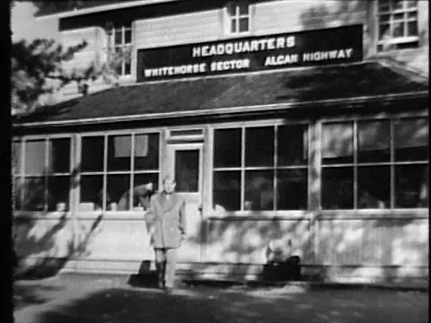 Builders of the Alaska Highway go through a food line, do laundry, bulldoze a Stock Footage 75287518