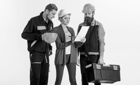 Builders and engineer work together. Team of architects Stock Photos