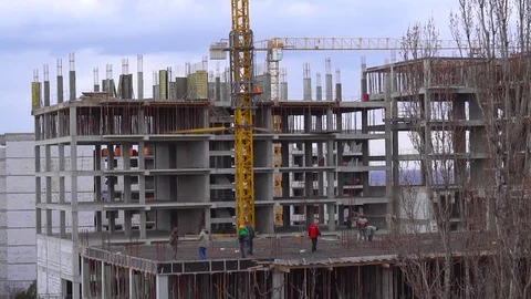 Builders are building a block of flats Stock Footage 73575181