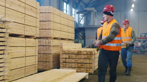 Builders are building materials, put them in a stack Stock Footage 61945293