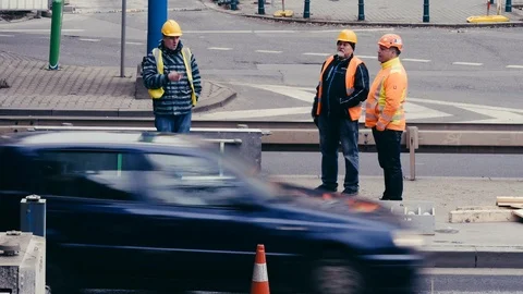 Builders are having a rest on the street Stock Footage 85434548