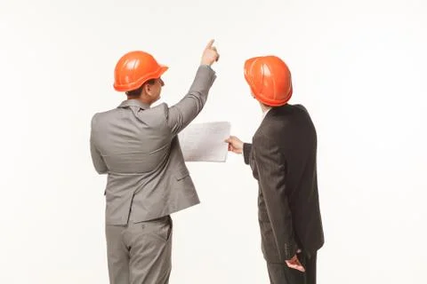 Builders are looking for project white background Stock Photos