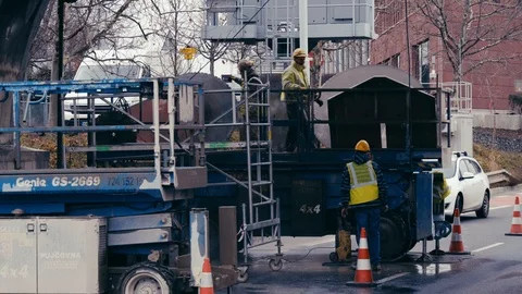 Builders are working on the street Stock Footage 85434651
