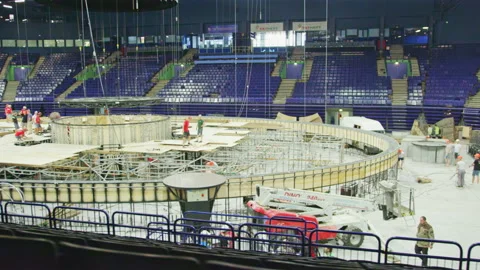 Builders assemble swimming pool carcass at sports stadium Stock Footage 236709341
