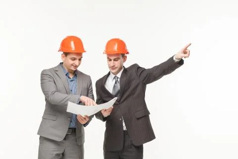 Builders with blueprints Stock Photos