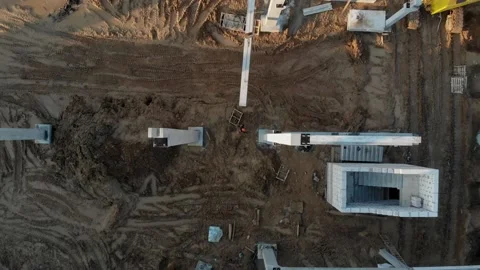 Builders build a house at sunset top view Video stock 138078237