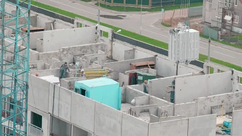 Builders build a multi-storey house Stock Footage 88971717