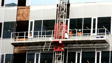 Builders on a building Stock Footage 8677086