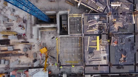 Builders on construction site aerial Vídeos de archivo 168580748