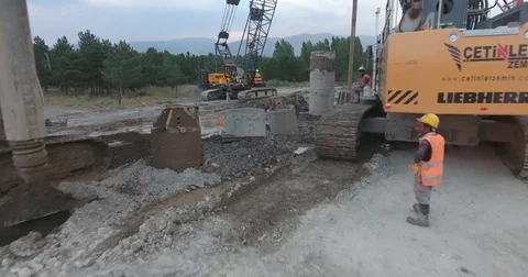 Builders On A Construction Site. Drilling Wells For Bored Piles Stock Footage 75688254