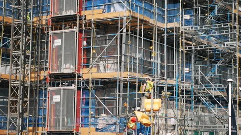 Builders on the construction site. Video stock 87763718