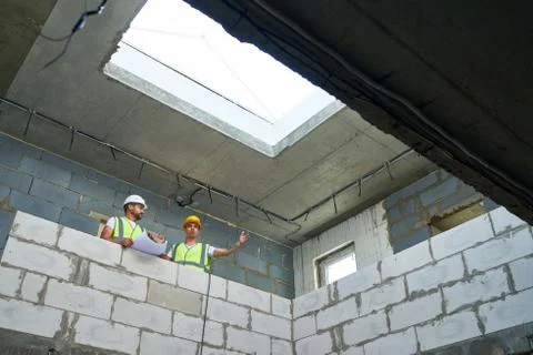 Builders on Construction Site 写真素材