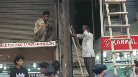 Builders in Delhi, shop front Stock Footage 10739746