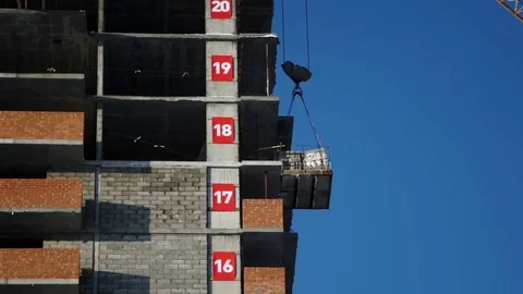 Builders detach ropes from stone blocks Stock Footage 82141088