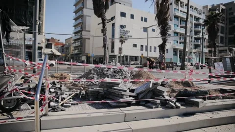 Builders dug a hole to replace the pipes against the problem, the pavement was Stock Footage 170611820