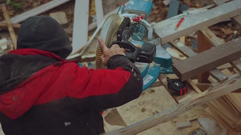 Builders of a frame house, construction of a wooden house Stock Footage 346990276