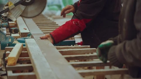 Builders of a frame house, construction of a wooden house Stock Footage 346990293