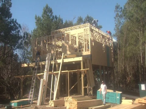 BUILDERS FRAMING A HOUSE IN TIMELAPSE2 Stock Footage 76584286