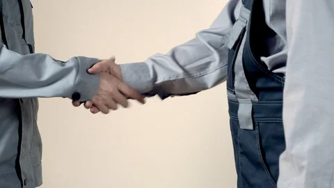 Builders greet hands. Handshake to a bargain. Stock Footage 102777464