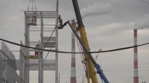 Builders at the height of Stock Footage 70984065