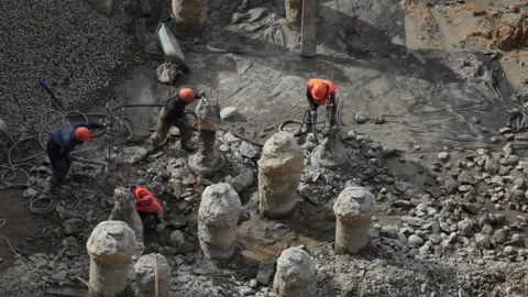 Builders with jackhammers hard work Stock Footage 105463316