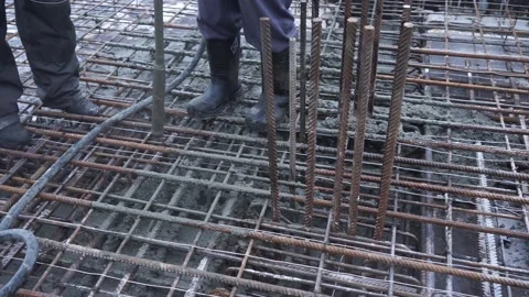 Builders make reinforcement mesh for concrete Stock Footage 163566945