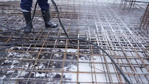 Builders make reinforcement mesh for concrete Stock Footage 163566947