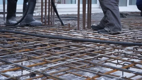 Builders make reinforcement mesh for concrete Stock Footage 163566986