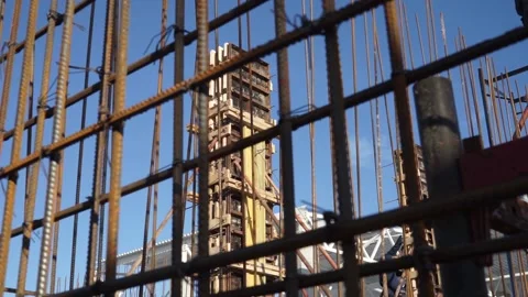 Builders make reinforcement mesh for concrete Stock Footage 163567908