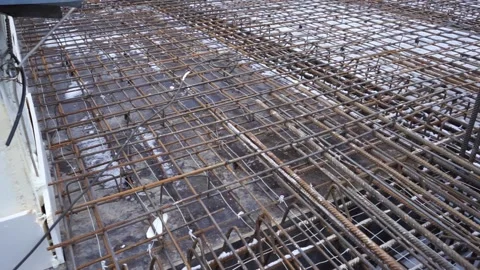 Builders make reinforcement mesh Stock Footage 163566861