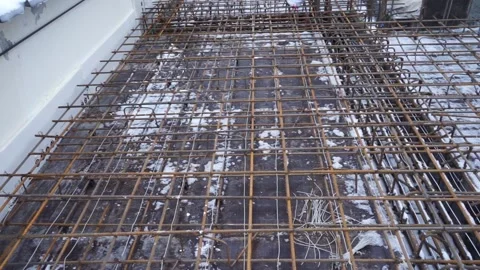 Builders make reinforcement mesh Stock Footage 163566865