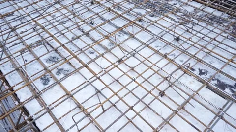 Builders make reinforcement mesh Stock Footage 163566874