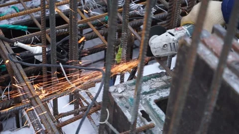 Builders make reinforcement mesh Stock Footage 163566905