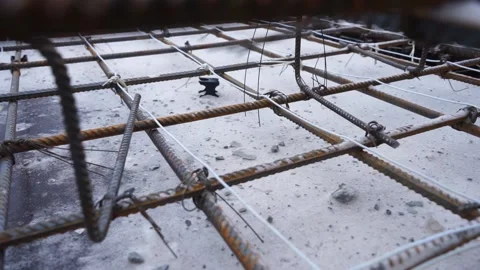 Builders make reinforcement mesh Stock Footage 163566920