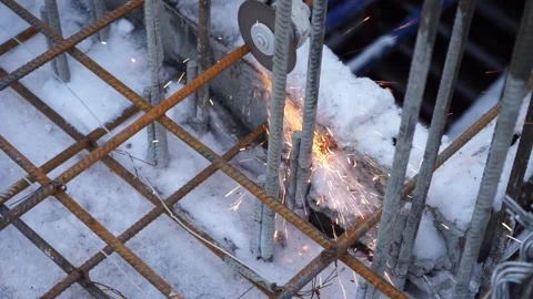 Builders make reinforcement mesh Stock Footage 163566922