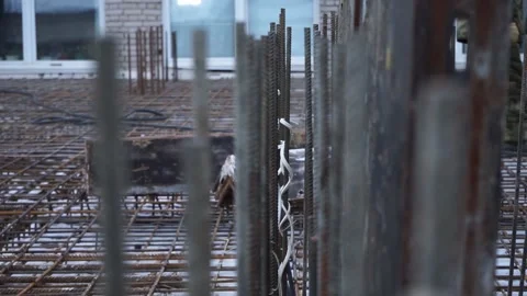 Builders make reinforcement mesh Stock Footage 163566924
