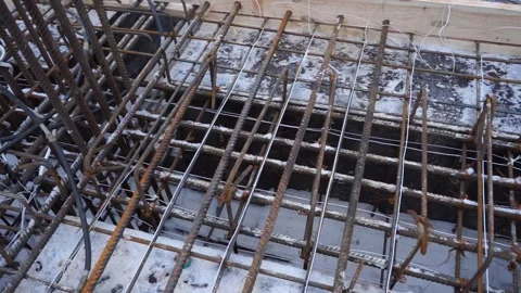Builders make reinforcement mesh Stock Footage 163566936