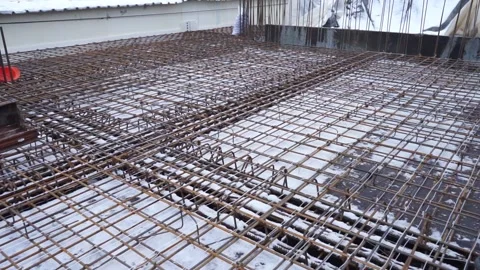 Builders make reinforcement mesh Stock Footage 163566955