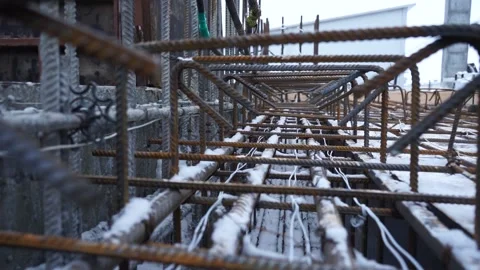 Builders make reinforcement mesh Stock Footage 163566960
