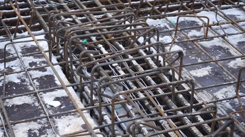 Builders make reinforcement mesh Stock Footage 163566977