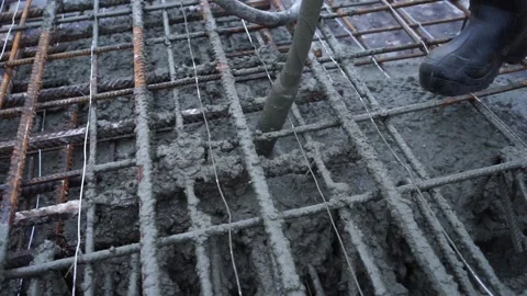 Builders make reinforcement mesh Stock Footage 163566991