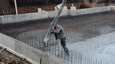 Builders, pouring the concrete, floor slabs. Stock Footage 63392431