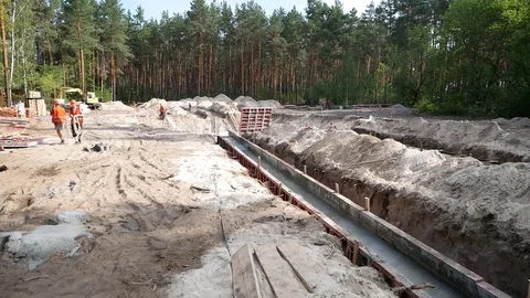 Builders pull electrical cable Stock Footage 100363984