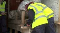 Builders sawing wood HD Footage