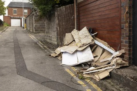 Builders Waste Material Dumped in a side street in Hanley stoke on trent Foto stock