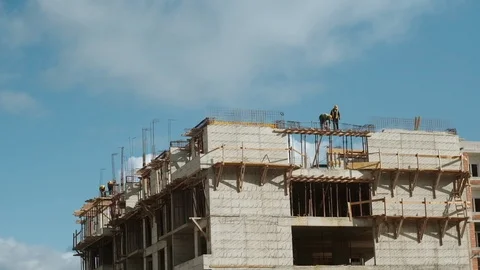 Builders work on monolithic works at the construction site Stock Footage 127032672